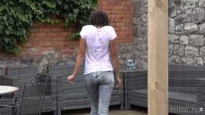 sassy-danielle-gets-wet-in-her-jeans-and